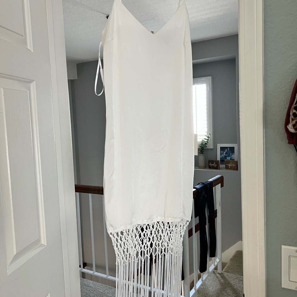 White fringe slip dress.